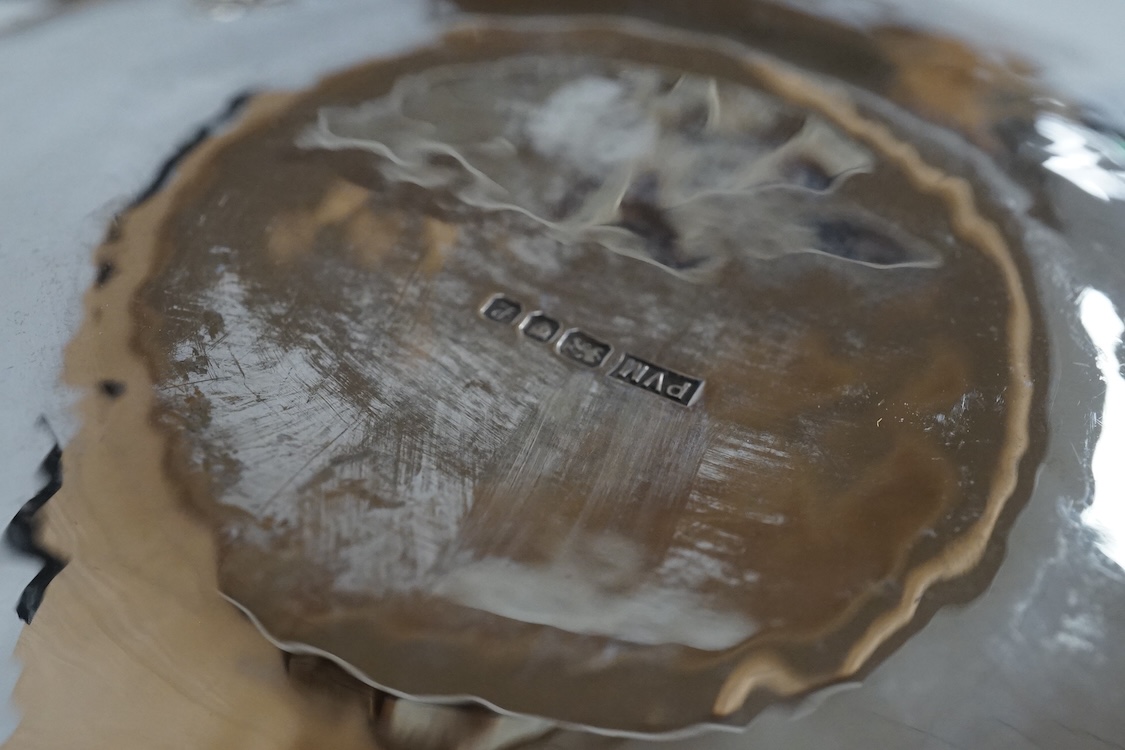 Three contemporary silver pin dishes including a planished pair by Paul Victor Markey, diameter 10.1cm and one by Robert Edgar Stone, together with a modern silver coin dish, 8.3oz.